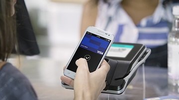 Using Visa Mobile Pay at a contactless-enabled terminal. Using Visa Mobile Pay at a contactless-enabled terminal.