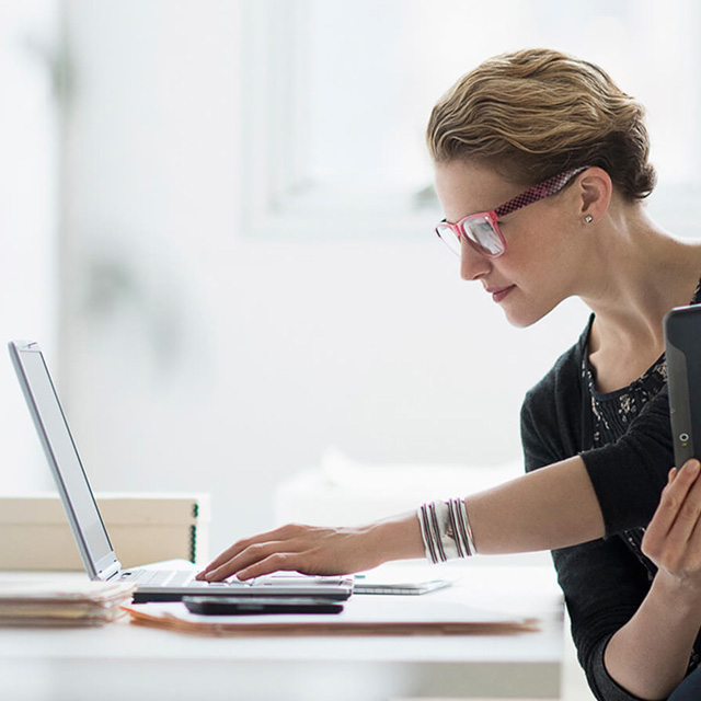 Woman looking at computer