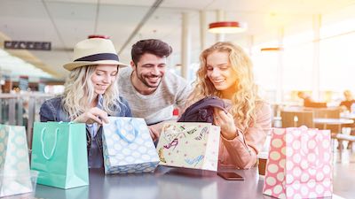 Group of people opening gifts.